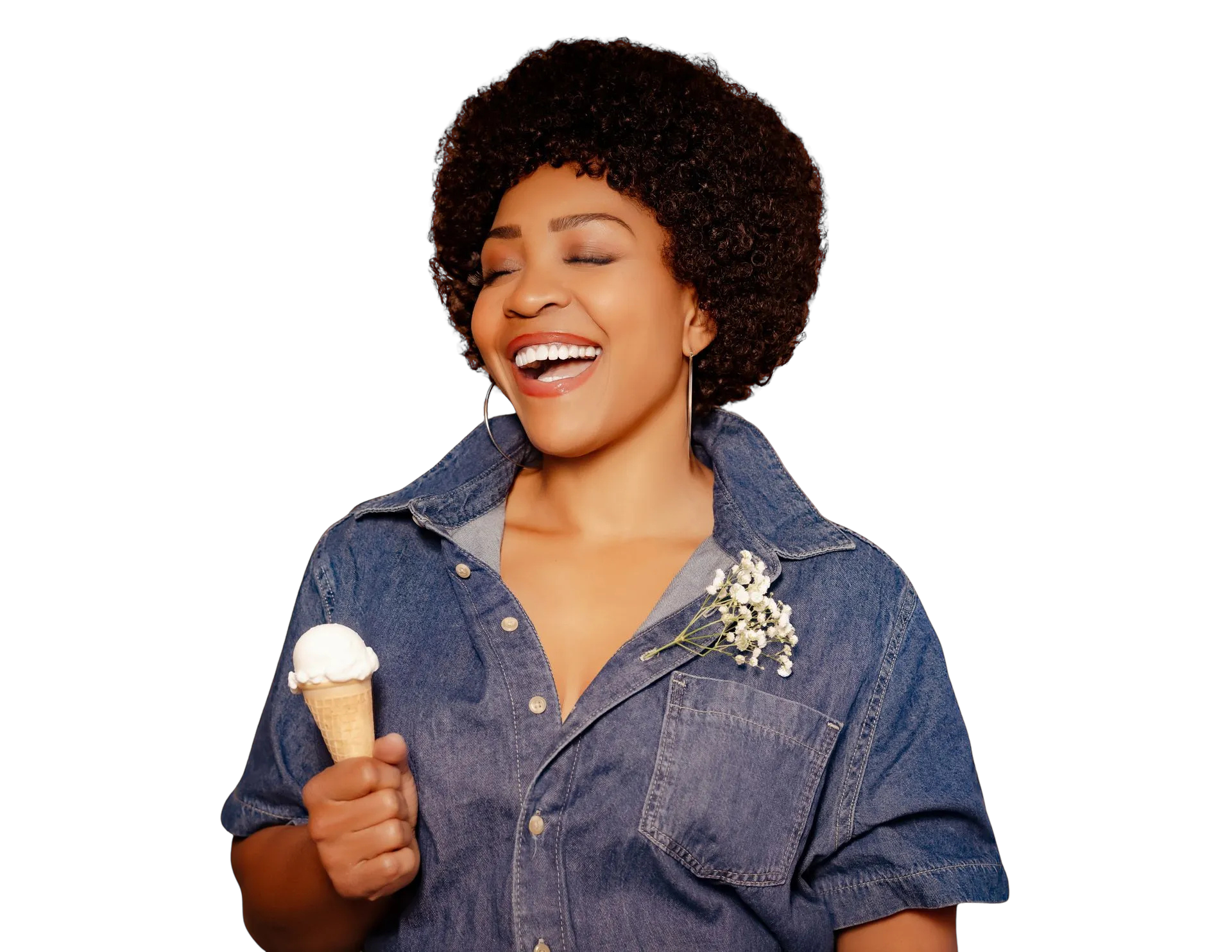 Divine Brown as Minnie Riperton, laughing in a denim jumpsuit holding an ice cream cone